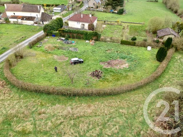 Afficher la photo en grand terrain à vendre - 1204.0 m2 - BAGNOLES DE L ORNE NORMANDIE - 61 - BASSE-NORMANDIE - Century 21 Agence Pays D'Andaines